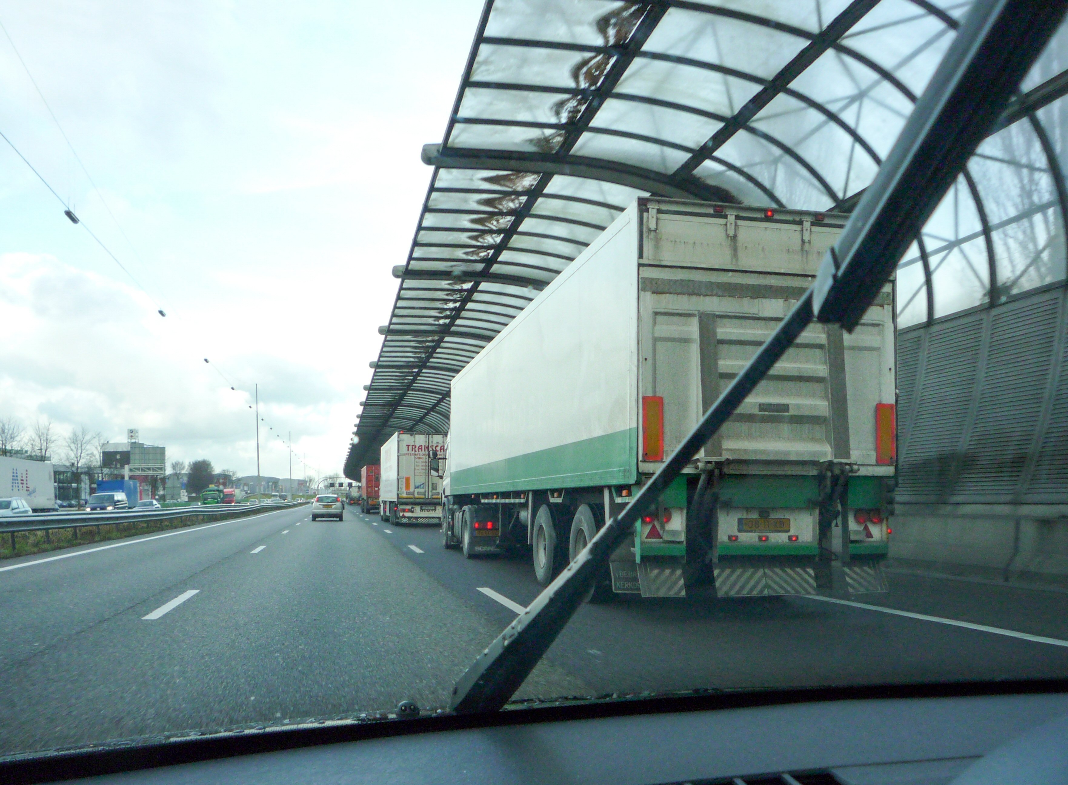Road_noise_barrier_on_the_A16.jpg