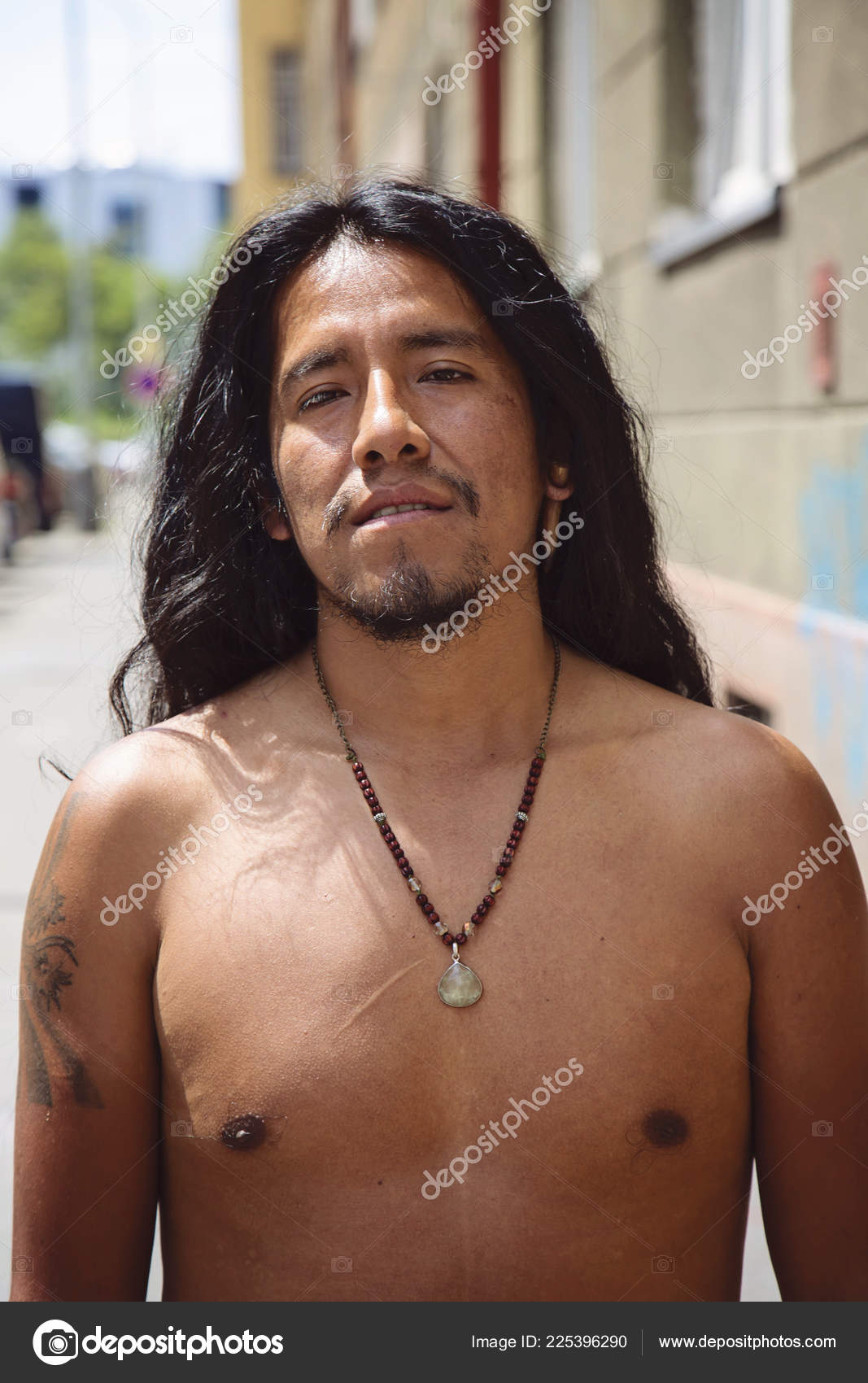 depositphotos_225396290-stock-photo-city-portrait-young-latino-man.jpg