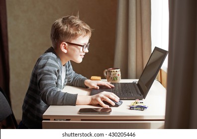 happy-boy-sitting-his-desk-260nw-430205446.jpg
