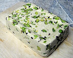 Halva decorated with pistachios - Sweets - Syria