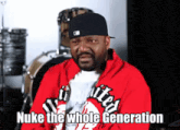 a man wearing a red sweatshirt and a black hat says nuke the whole generation