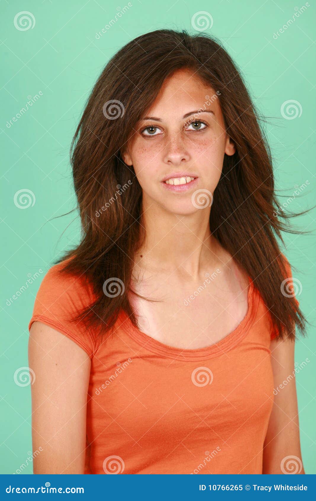 teen-girl-orange-shirt-10766265.jpg