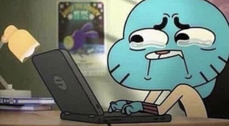 this image of gumball crying while typing on his laptop