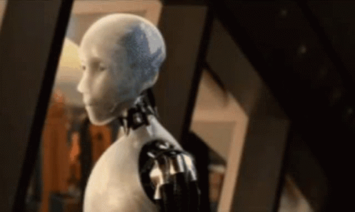 a close up of a robot 's head and arms .