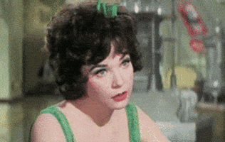 Confused Shirley Maclaine GIF