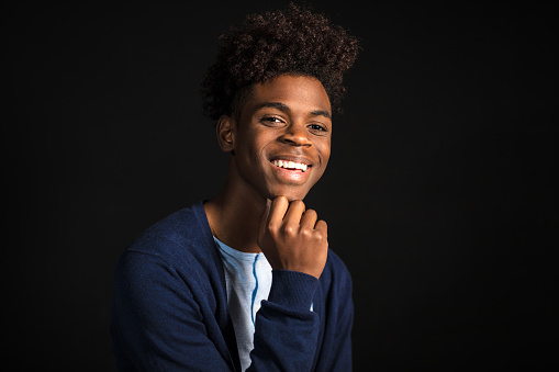 happy-teenage-boy-with-afro-hairstyle.jpg