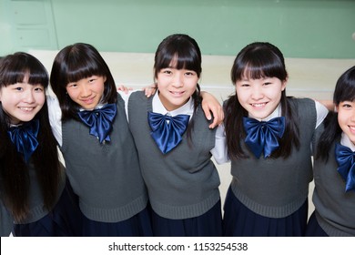 japanese-girls-partnering-shoulder-260nw-1153254538.jpg