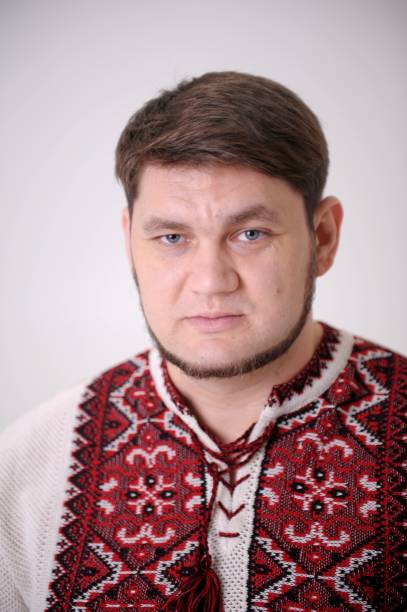 portrait-of-a-handsome-man-with-a-discerning-eye-man-in-the-classic-ukrainian-embroidered.jpg