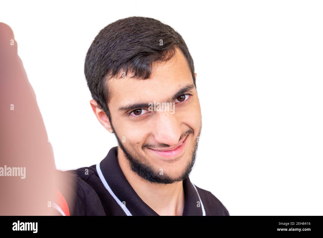 arabic-guy-smile-while-taking-selfie-2EH8416.jpg