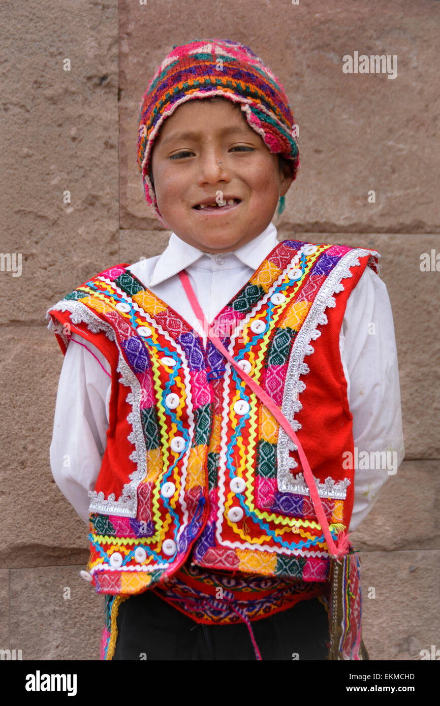 quechua-boy-wearing-traditional-clothing-of-the-region-moray-village-EKMCHD.jpg