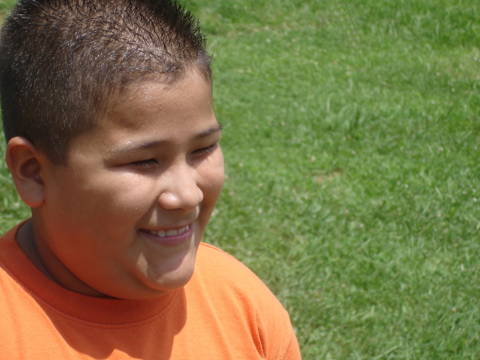 Boy smiling in sunlight Free Stock Photo | FreeImages