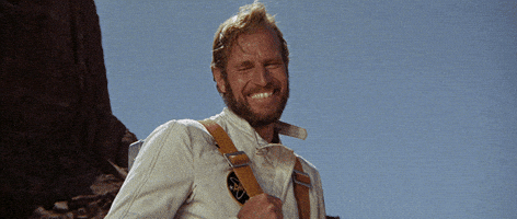 planet of the apes laughing GIF