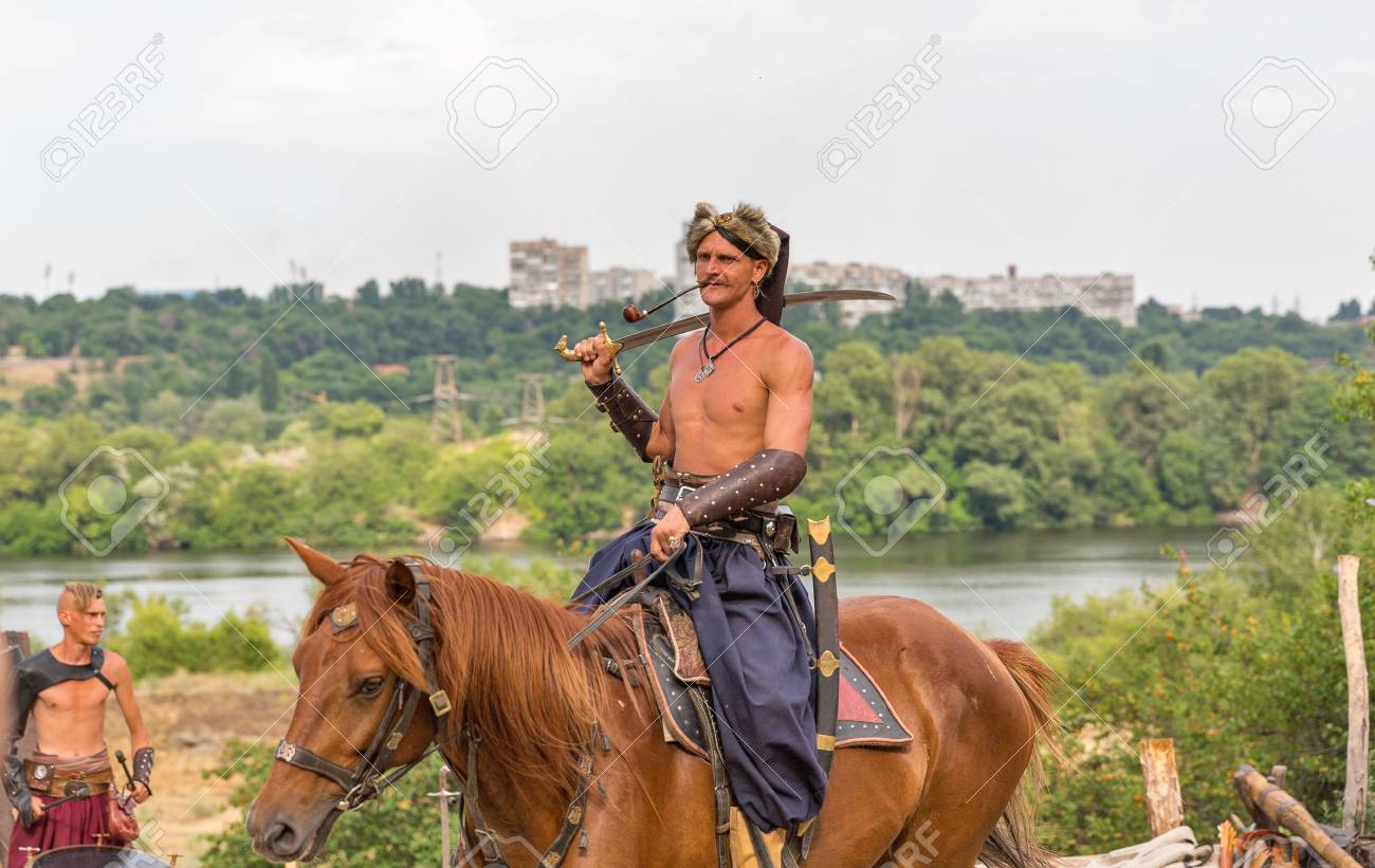 124912415-khortytsia-ukraine-july-03-2018-ukrainian-cossack-horseman-with-saber-in-zaporozhian-sich-it-was-inh.jpg