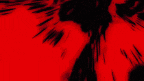 a close up of a red and white background with a blurred image