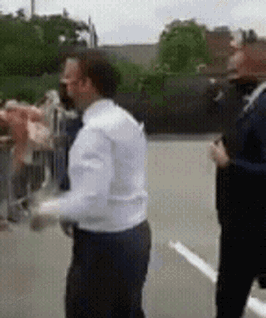 slapping-french-president-macron-mhzo3vxivf2muvny.gif