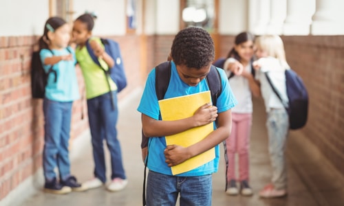 [Image: young-boy-bullied-at-school-500.jpg]