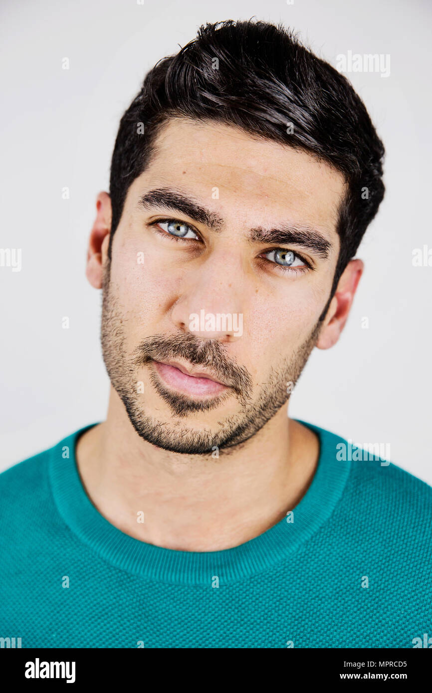 portrait-of-young-man-with-blue-eyes-and-stubble-MPRCD5.jpg