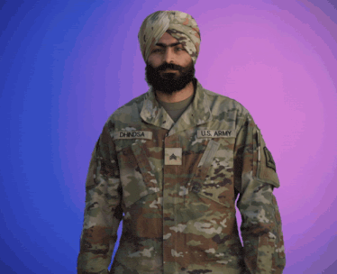 a man in a u.s. army uniform with the name dhndsa on his uniform