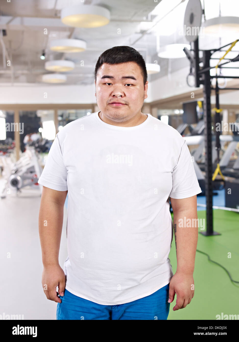 overweight-asian-man-DKDJ3X.jpg