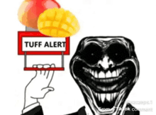 a troll is holding a sign that says tuff alert and a mango .