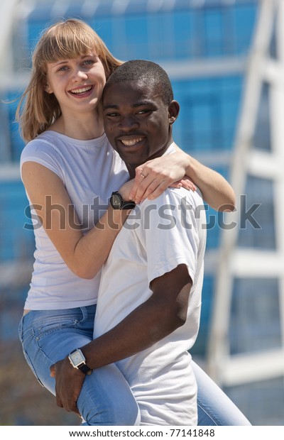 white-girl-black-guy-outdoors-600w-77141848.jpg