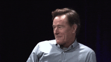 brian cranston mic drop GIF