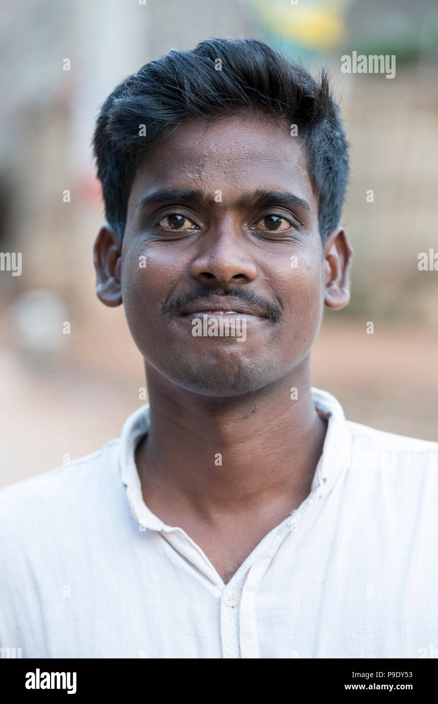 pondichery-puducherry-tamil-nadu-india-september-circa-2017-an-unidentified-portrait-of-a-young-poor-indian-male-smiling-in-front-of-the-camera-P9DY53.jpg