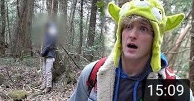This may contain: a man wearing a yoda hat in the woods with a trail number on it