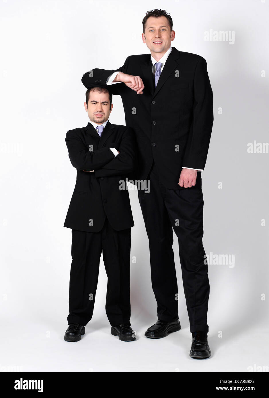 short-and-tall-businessmen-ARB8X2.jpg