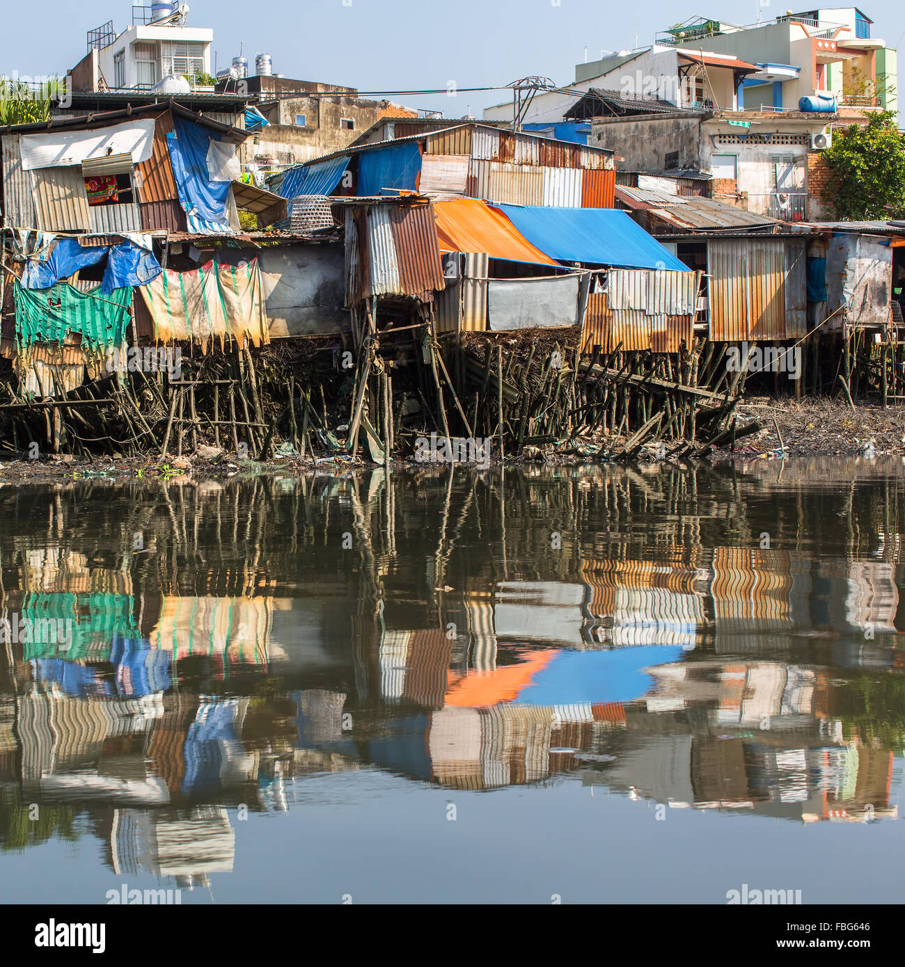 citys-slums-view-from-the-saigon-river-ho-chi-minh-city-vietnam-FBG646.jpg