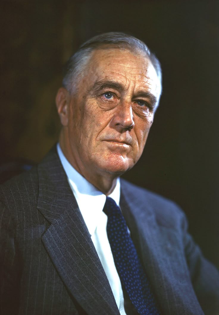 This may contain: an older man in a suit and tie looking off to the side with serious expression on his face