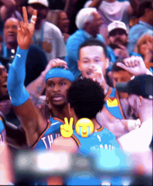 a thunder basketball player is giving a peace sign