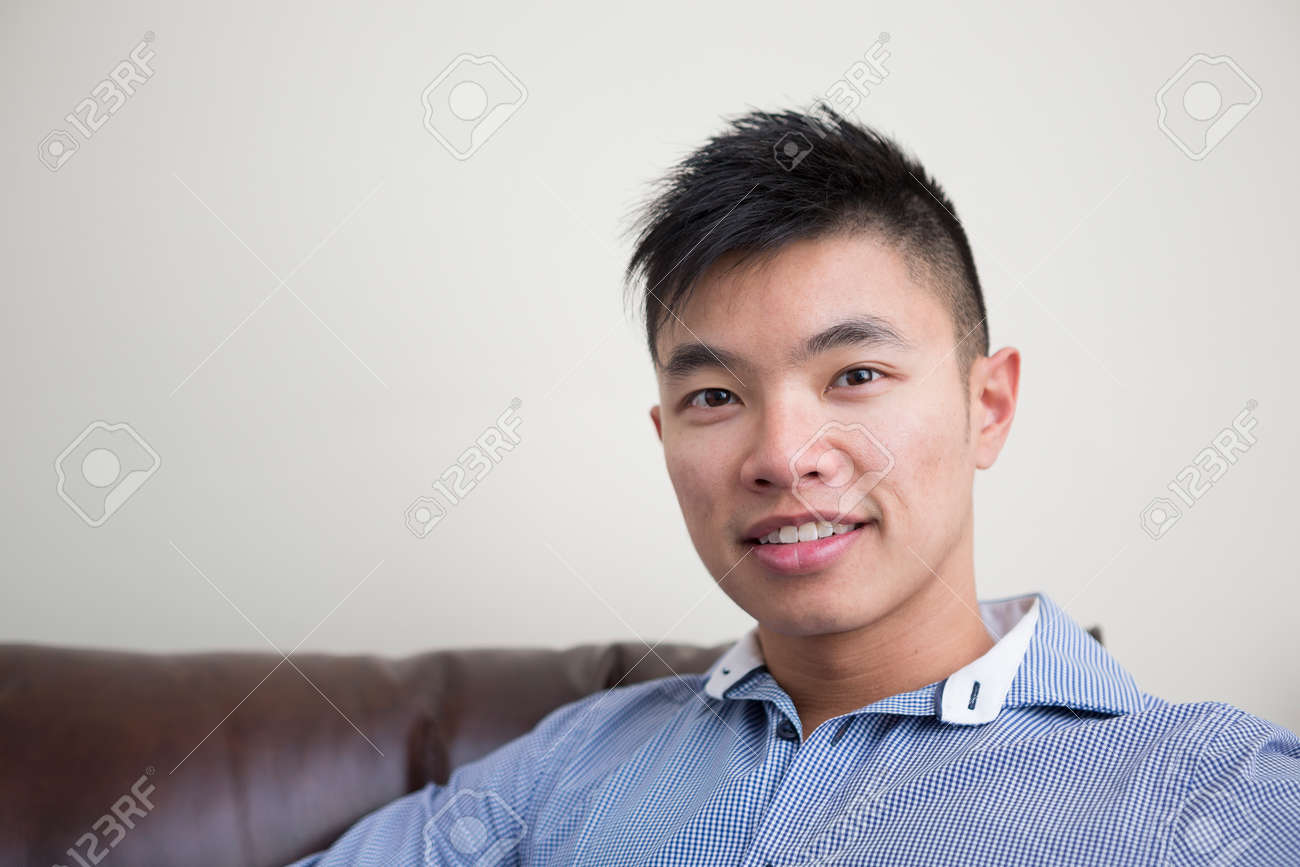 32983111-portrait-of-a-trendy-asian-man-at-home-chinese-man-relaxing-at-home-.jpg