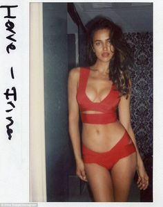 This contains an image of: Irina Shayk poses in bandage red bikini during her early modeling days