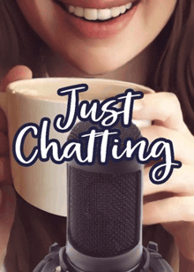a woman is holding a cup of coffee in front of a microphone with the words `` just chatting '' written on it .