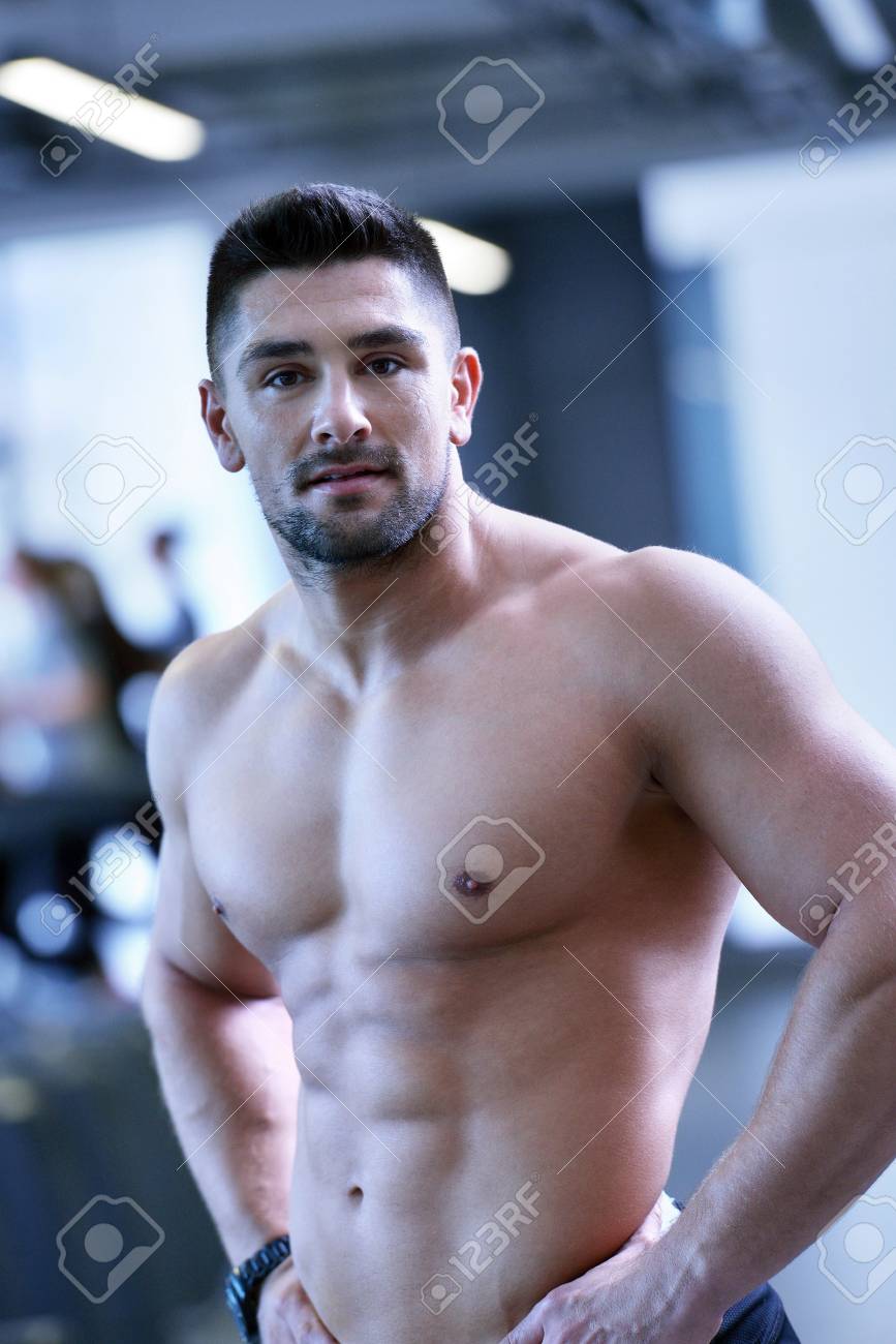 37457268-strong-handsome-man-exercising-at-the-gym.jpg