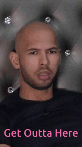 a bald man with a beard is sitting in front of a headboard with the words get outta here on it