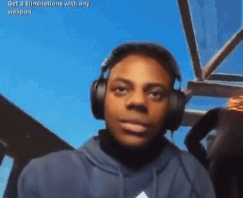 a man wearing headphones with the words get 3 eliminations with any weapon