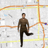 a map of a city with a man standing on one leg in the middle of it