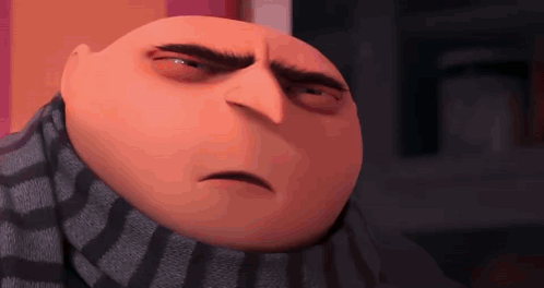 gru from despicable me is wearing a scarf around his neck and making a funny face .