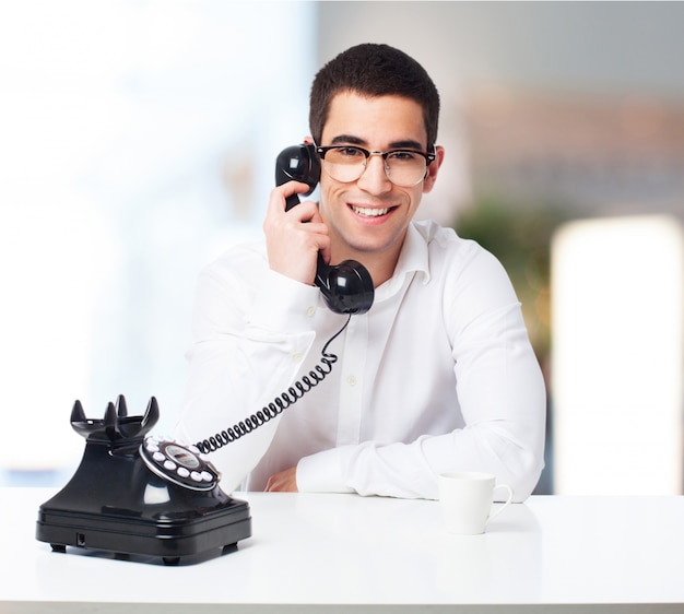 man-talking-old-phone_1187-3085.jpg