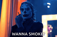 a joker smoking a cigarette with the words wanna smoke behind him