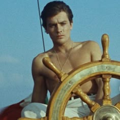 This contains an image of: Alain Delon