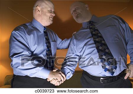 bald-twins-shaking-hands-stock-image__c0039723.jpg