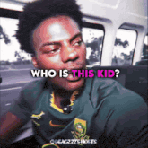 a man in a green shirt with the words who is this kid on the bottom