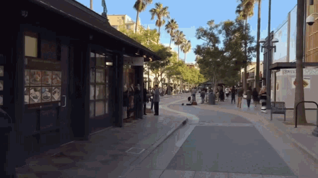 a busy city street with a sign that says delta