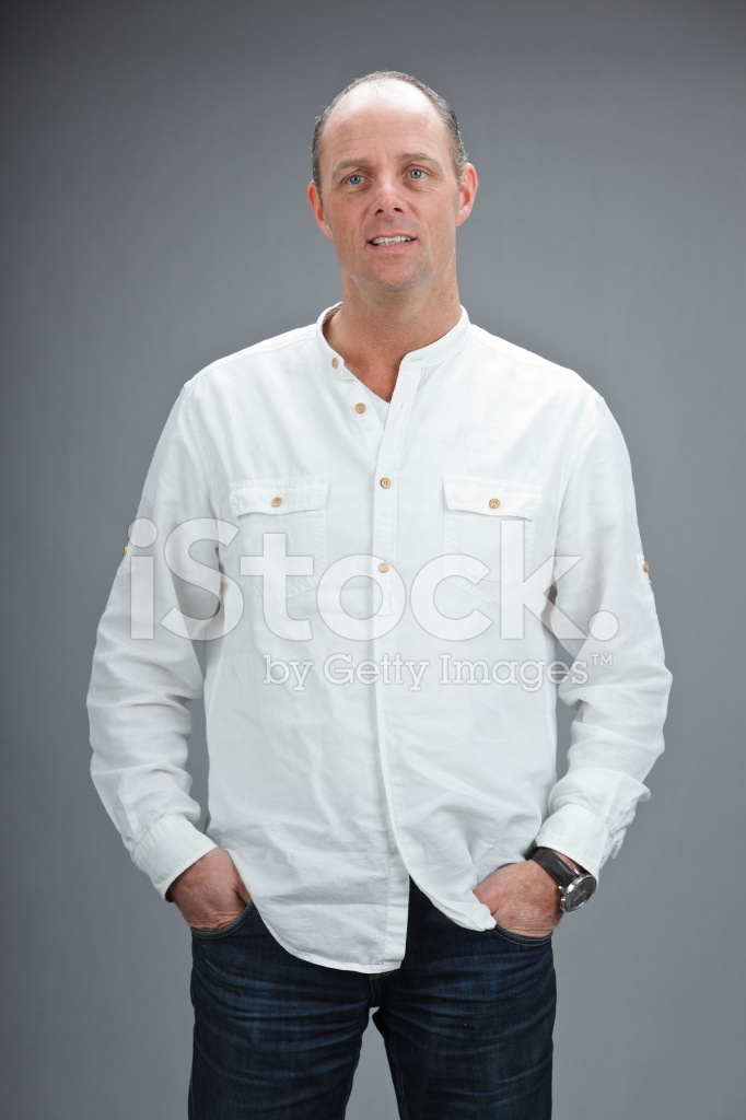 42339340-studio-portrait-of-middle-aged-man-with-white-shirt.jpg