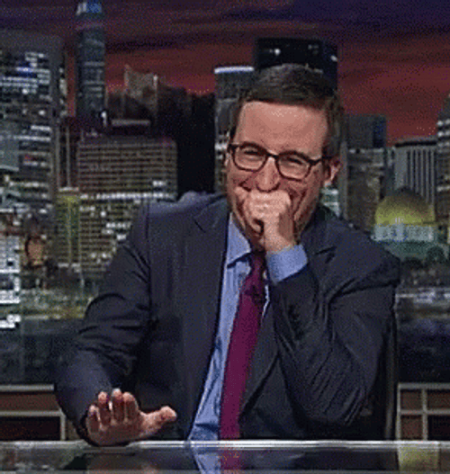 John Oliver Bursting Hysterical Laughing GIF | GIFDB.com