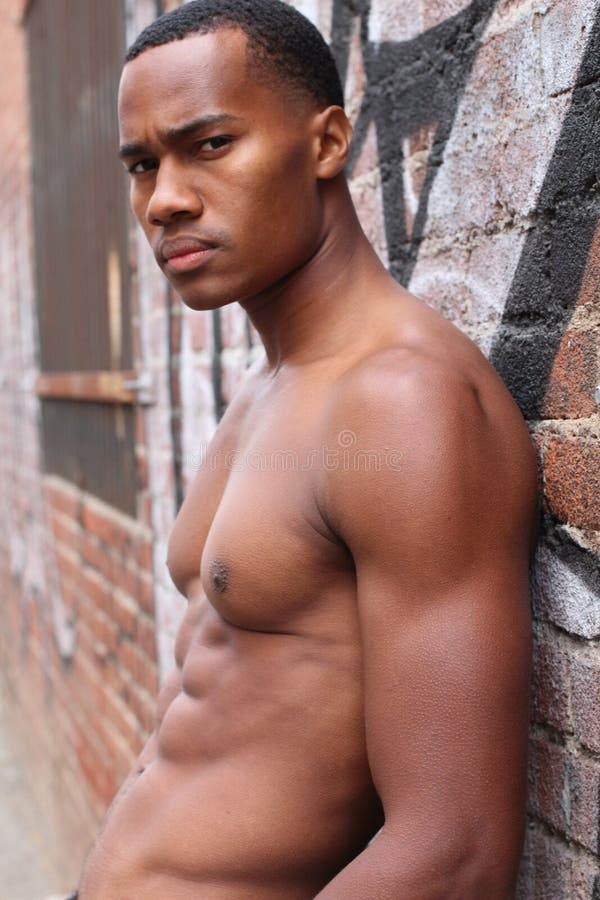 under-sunshine-masculine-black-guy-half-naked-standing-alley-rough-expression-portrait-young-fitness-74862809.jpg