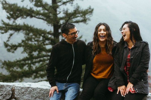 two-women-one-man-outdoors-laughing.jpg